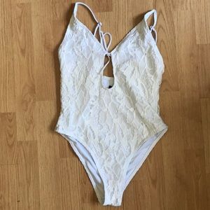 All white Kendall and Kylie one piece